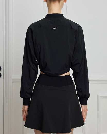 Woman wearing ISLAHOLA Aero Jacket in Core Black