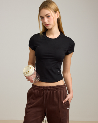Model wearing ISLACB047 Frame Line Sculpt Top in Core Black